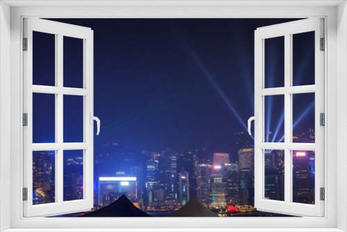 Fototapeta Naklejka Na Ścianę Okno 3D - View Night of Symphony of Lights and two boat of life at Victoria Harbor in Hong Kong.