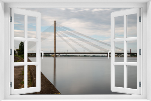 Fototapeta Naklejka Na Ścianę Okno 3D - Riga city, capital of Latvia panoramic view with river Daugava and cable bridge