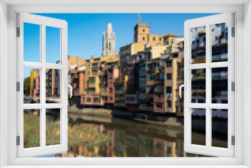 Fototapeta Naklejka Na Ścianę Okno 3D - Girona famous landmark river facade houses with water reflection