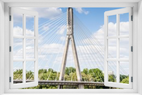 Fototapeta Naklejka Na Ścianę Okno 3D - The pylon of the cable-stayed cradle-system bridge on the blue sky background.  Swietokrzyski bridge, Warsaw, Poland, 2018.