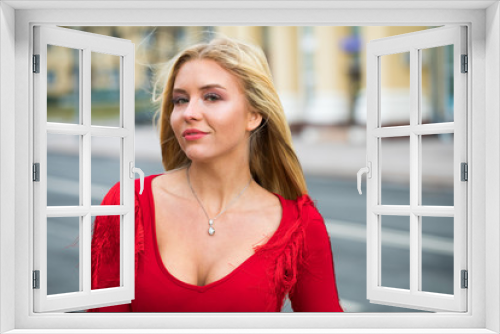 Bautiful blonde in sexy red dress