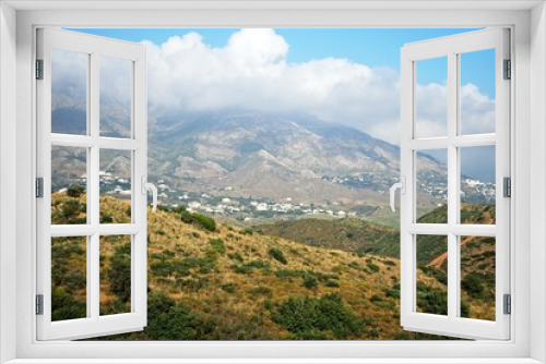 View across countryside towards the Sierra de Mijas mountains near Fuengirola, Spain.