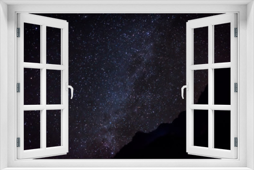 Fototapeta Naklejka Na Ścianę Okno 3D - milky way stars behind mountain
