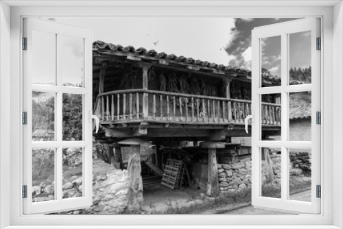 Fototapeta Naklejka Na Ścianę Okno 3D - Horreo asturiano. Asturian barn. Popular architecture in Riocaliente. Asturias. Spain.