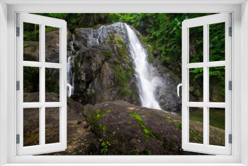 Fototapeta Naklejka Na Ścianę Okno 3D - Waterfalls in the rainforest photographed in Khao Yai National Park, Thailand.