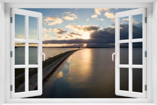 Fototapeta Naklejka Na Ścianę Okno 3D - Aerial panoramic view of a beautiful beach on the Atlantic Ocean during a cloudy sunrise. Taken at Crescent Beach, Nova Scotia, Canada.