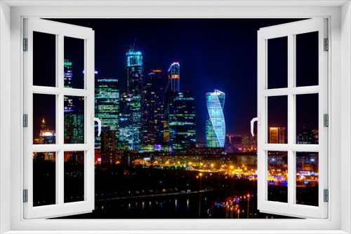 Fototapeta Naklejka Na Ścianę Okno 3D - View of the lights of Moscow city from the hill at night