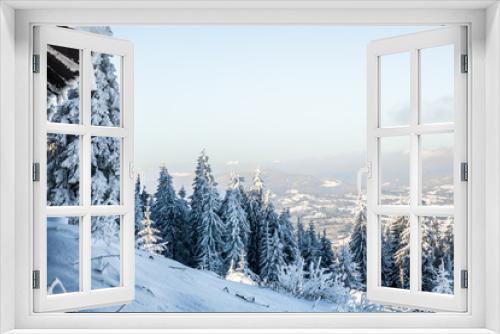 Fototapeta Naklejka Na Ścianę Okno 3D - winter mountaine landscape from wooden hut in the snowy forest