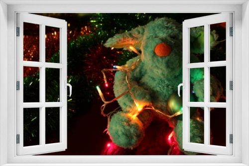 Fototapeta Naklejka Na Ścianę Okno 3D - Teddy bear Christmas tree balls, lights and garlands