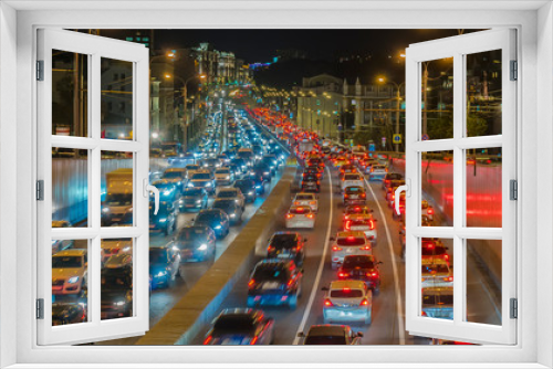 Fototapeta Naklejka Na Ścianę Okno 3D - night traffic on the urban thoroughfare,overpass,   and road junction