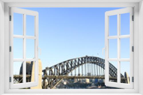 Fototapeta Naklejka Na Ścianę Okno 3D - Sydney Harbour Bridge as viewed from a high vantage point at dawn.