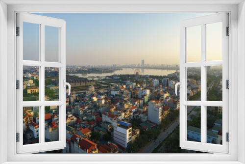 Fototapeta Naklejka Na Ścianę Okno 3D - Aerial skyline view of Hanoi city, Vietnam. Hanoi cityscape by sunset period at West Lake, Ho Tay district