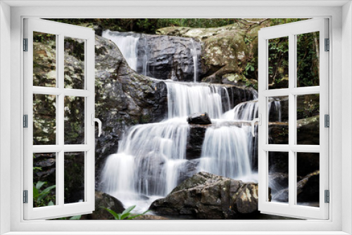 Fototapeta Naklejka Na Ścianę Okno 3D - Mountain river background with small waterfalls in tropical forest.
