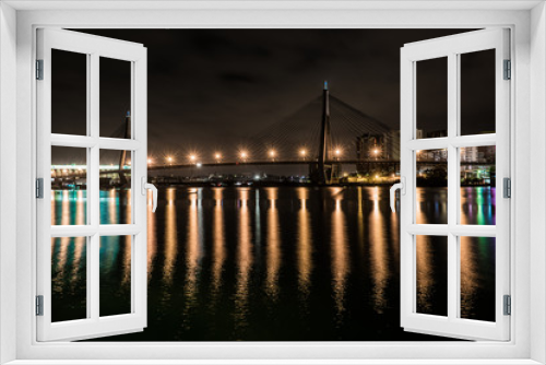 Fototapeta Naklejka Na Ścianę Okno 3D - bridge at night wit reflections and apartments