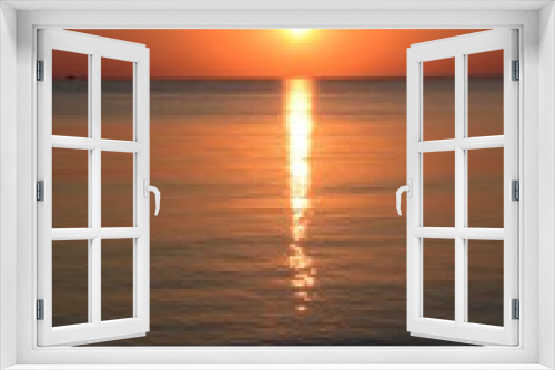 Fototapeta Naklejka Na Ścianę Okno 3D - Sonnenaufgang mit Spiegelung im Meer