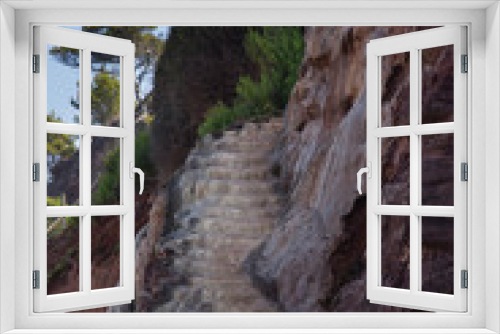 Fototapeta Naklejka Na Ścianę Okno 3D - Escalera tallada en la roca en la costa de Mallorca, Baleares