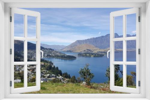 Fototapeta Naklejka Na Ścianę Okno 3D - This is a mountain lookout of Queenstown, New Zealand. This is one of New Zealand's top travel destinations.  There are many activities to do or just enjoy the beautiful nature here.