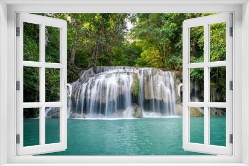 Fototapeta Naklejka Na Ścianę Okno 3D - Erawan water fall (Second floor), tropical rainforest at Srinakarin Dam, Kanchanaburi, Thailand.Erawan water fall is  beautiful waterfall in Thailand. Unseen Thailand - Image
