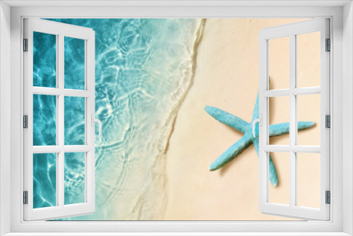 Fototapeta Naklejka Na Ścianę Okno 3D - Starfish on the sand beach and ocean as background. Summer beach.