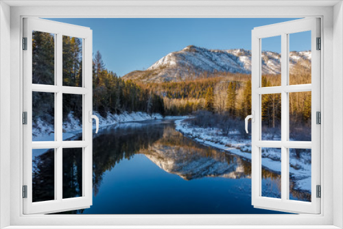 Fototapeta Naklejka Na Ścianę Okno 3D - Peaceful calm sunny day at McDonald Creek, Glacier National Park, Montana in December