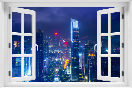 Fototapeta Naklejka Na Ścianę Okno 3D - Night cityscape of guangzhou urban skyscrapers at storm with lightning  bolts in night purple blue sky, Guangzhou, China