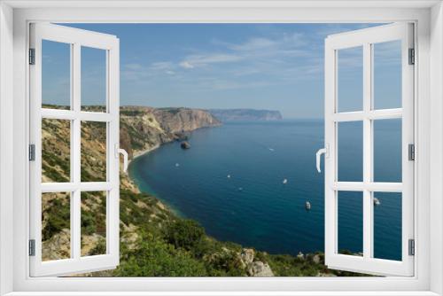 Fototapeta Naklejka Na Ścianę Okno 3D - The view from the cliffs on the sea fog in which the yachts float.