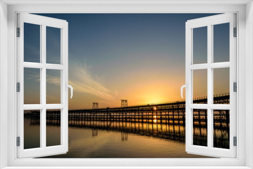Fototapeta Naklejka Na Ścianę Okno 3D - Sunset over the Rio Tinto Pier, Huelva, Andalusia, Spain
