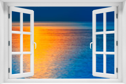 Fototapeta Naklejka Na Ścianę Okno 3D - Gorgeous End of Day at the Sea / Natural spectacle - colorful blue and orange reflecting sunset at sea horizon (copy space)