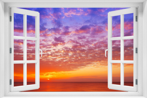Fototapeta Naklejka Na Ścianę Okno 3D - Beautiful, orange-pink sunset over the sea. Background image.