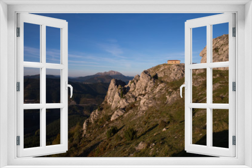 Ermitage of Aitzorrotz at the top of the rock in Eskoriatza, Basque Country.