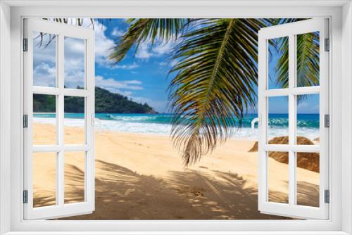 Fototapeta Naklejka Na Ścianę Okno 3D - Sandy beach with palms and turquoise sea in Seychelles island.  Summer vacation and travel concept.  