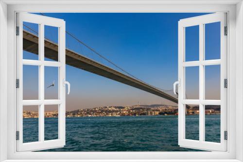 Fototapeta Naklejka Na Ścianę Okno 3D - The grand bridge of Sultan Mehmed Fatih through the Bosphorus, Turkey