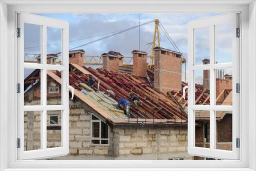 Fototapeta Naklejka Na Ścianę Okno 3D - the roof of a high building in construction