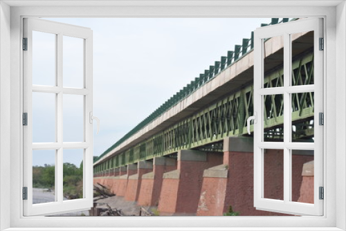 Fototapeta Naklejka Na Ścianę Okno 3D - puente y edificios en sgo del estero