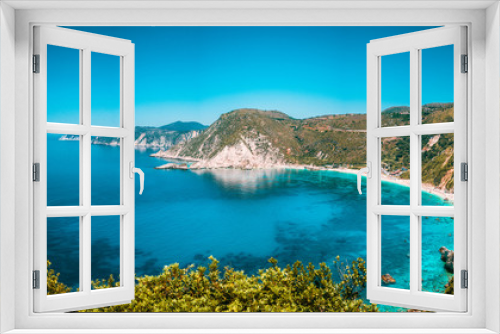 Fototapeta Naklejka Na Ścianę Okno 3D - Panorama View to Petani beach with transparent and crystal clear blue mediterranean sea water in picturesque bay, Kefalonia island, Greece