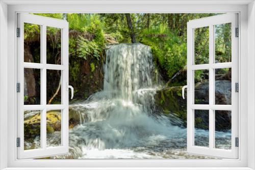 Fototapeta Naklejka Na Ścianę Okno 3D - Small waterfall in a green forest in Sweden
