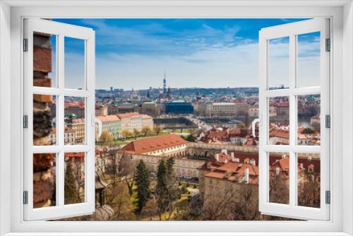 Fototapeta Naklejka Na Ścianę Okno 3D - The beautiful Prague city old town seen form the Prague Castle viewpoint in an early spring day