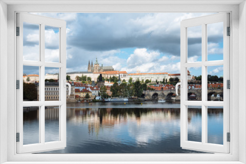 Fototapeta Naklejka Na Ścianę Okno 3D - Cityscape of Prague and Vltava river with reflections