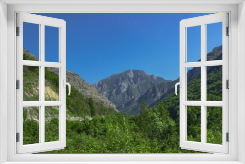 Fototapeta Naklejka Na Ścianę Okno 3D - Mountain landscape in the summer cloudy day. Soft focus and blurred background.