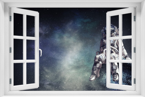 Fototapeta Naklejka Na Ścianę Okno 3D - Spaceman in cosmos. Mixed media