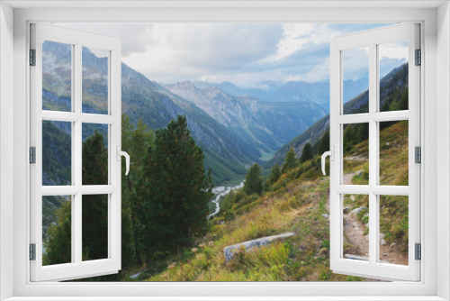 Fototapeta Naklejka Na Ścianę Okno 3D - Mountains in the Swiss Alps with glaciers, rivers and distant mountain valleys.