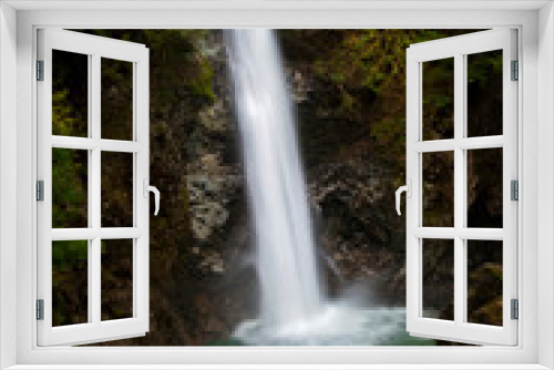 Fototapeta Naklejka Na Ścianę Okno 3D - Cascade Falls Regional Park. Located Northeast of Mission, British Columbia, Cascade Falls is a scenic waterfall that can be viewed from a suspension bridge that crosses the river.