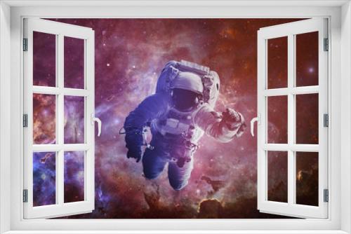 Fototapeta Naklejka Na Ścianę Okno 3D - Astronaut - Elements of this Image Furnished by NASA