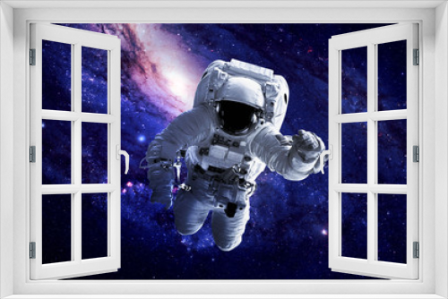 Fototapeta Naklejka Na Ścianę Okno 3D - Astronaut in Space - Elements of this Image Furnished by NASA