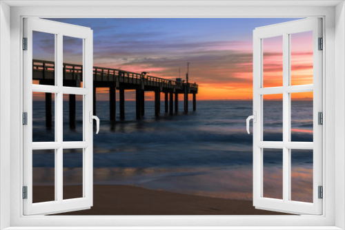 Fototapeta Naklejka Na Ścianę Okno 3D - Sunrise over the Atlantic Ocean at the St. Augustine Beach Pier in St. Augustine, Florida