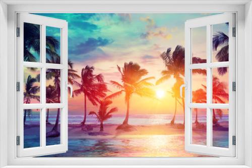 Fototapeta Naklejka Na Ścianę Okno 3D - Palm Trees Silhouettes On Tropical Beach At Sunset - Modern Vintage Colors
