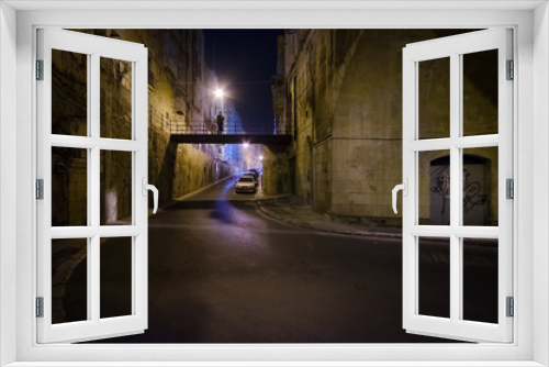 Fototapeta Naklejka Na Ścianę Okno 3D - Night walks in the dark along the old streets of Valletta. Maltese style.
