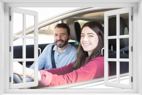 Smiling Woman Enjoying Car Ride With Man