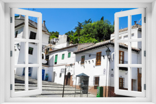Fototapeta Naklejka Na Ścianę Okno 3D - Albaicin, Old muslim quarter, district of Granada in Spain. White houses street.