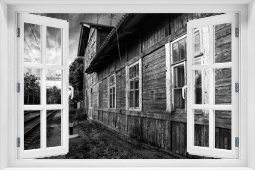 Fototapeta Naklejka Na Ścianę Okno 3D - old wooden building at railway station, black and white